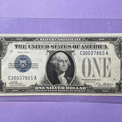 Series of 1928 Crisp AU/Uncirculated Condition "FUNNY BACK" Silver Certificate as Pictured.