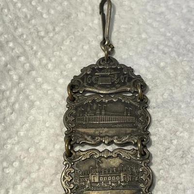 ANTIQUE 1607/1907 JAMESTOWN Ter-Centennial Exposition Silver Watch Fob in Good Preowned Condition.