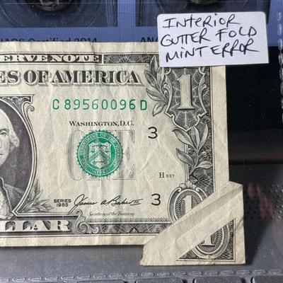 Series of 1985 Federal Reserve Banknote "Corner Gutter Fold Error" in Circulated Condition as Pictured.