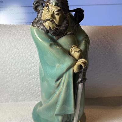 Vintage Chinese Mudmen Pottery Warrior Figurine w/Sword 7" Tall in Good Preowned Condition.