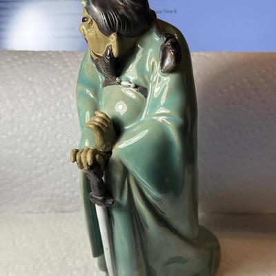 Vintage Chinese Mudmen Pottery Warrior Figurine w/Sword 7" Tall in Good Preowned Condition.