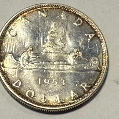 1953 Canada Silver Dollar with Shoulder Straps in Choice Brilliant Uncirculated as Pic'd.