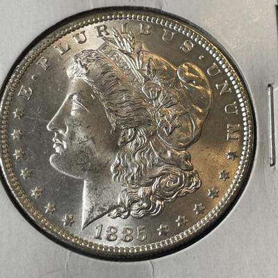 1885-0 UNCIRCULATED CONDITION MORGAN SILVER DOLLAR (COIN #6).