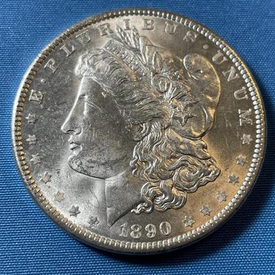 1890-P UNCIRCULATED CONDITION MORGAN SILVER DOLLAR (COIN #10).