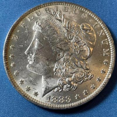 1883-O UNCIRCULATED CONDITION MORGAN SILVER DOLLAR (COIN #13).