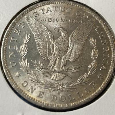 1884-O UNCIRCULATED CONDITION MORGAN SILVER DOLLAR (COIN #15).