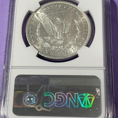 NGC CERTIFIED 1879-O MS60 WHITE MORGAN SILVER DOLLAR AS PICTURED. (Coin #007).