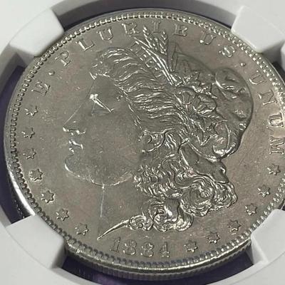 NGC CERTIFIED 1884-S AU DETAILS/CLEANED MORGAN SILVER DOLLAR AS PICTURED. (Coin #003).