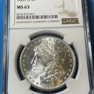 NGC CERTIFIED 1881-S MS63 GRADED MORGAN SILVER DOLLAR AS PICTURED. (COIN #011).