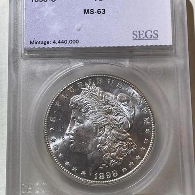 SEGS CERTIFIED 1898-O MS63 PROOF LIKE MORGAN SILVER DOLLAR AS PICTURED.
