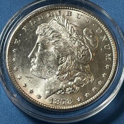 1878-S UNCIRCULATED CONDITION MORGAN SILVER DOLLAR AS PICTURED. (COIN #75A).