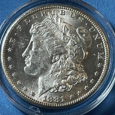 1881-S UNCIRCULATED CONDITION MORGAN SILVER DOLLAR AS PICTURED. (COIN #77A).