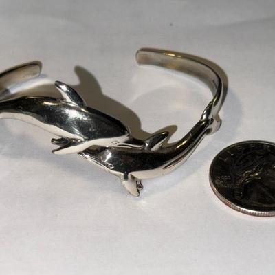 VINTAGE PREOWNED STERLING SILVER FIGURAL DOLPHIN CUFF BRACELET 17.7 GRAMS TW STANDARD SIZE 7".