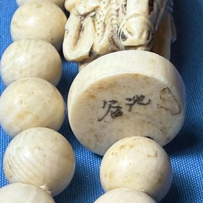 Scarce Asian 19th Century 36" Carved Bone Necklace and believed to be "Shou Lao God of Longevity" Netsuke Figure on a...