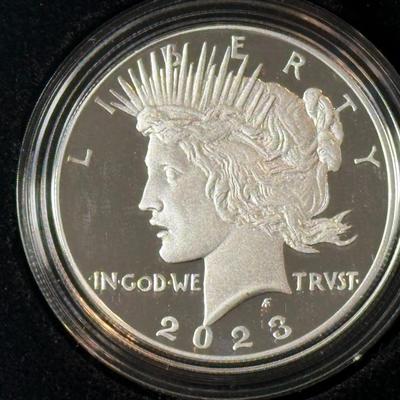 2023-S PROOF PEACE SILVER DOLLAR IN ORIGINAL BOX W/PAPERWORK AS PICTURED.