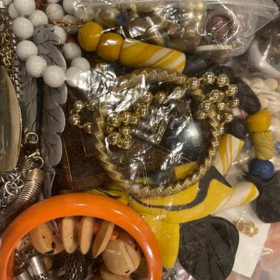 Large bag of vintage colorful jewelry