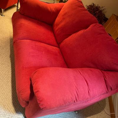 Ashely loveseat in plush red fabric