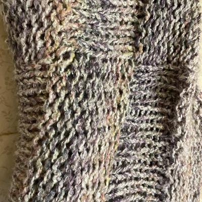 Modern style accent chair with soft afghan