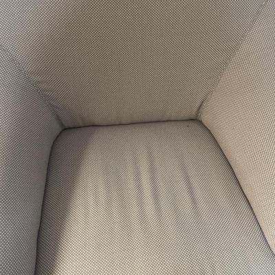 Modern style accent chair with soft afghan