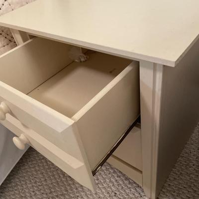 2 cream nightstands by Modern Furniture