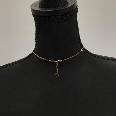 Marked dainty gold tone star chain necklace