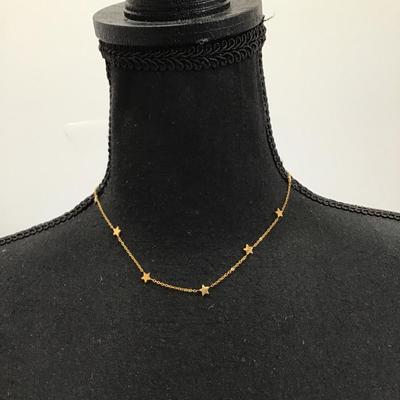 Marked dainty gold tone star chain necklace