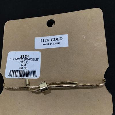 Nice Gold toned flower slider bracelet