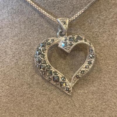 Stunning sterling cross and heart pendant