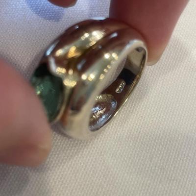 Silver ring with green stone