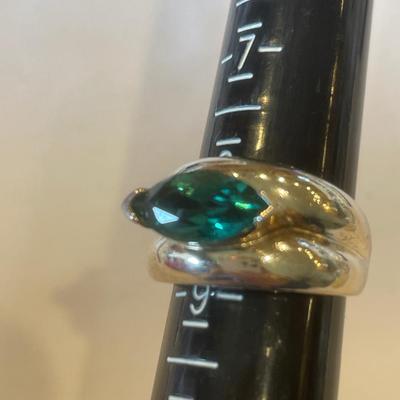 Silver ring with green stone