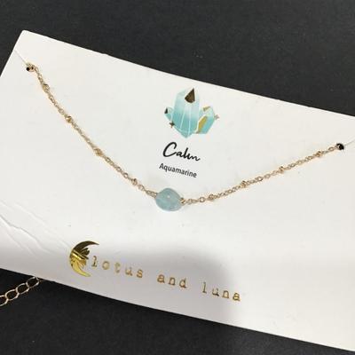 Lotus in Luna calm aquamarine stone necklace