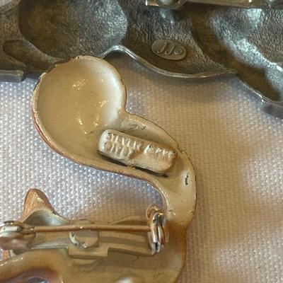 Animal brooches