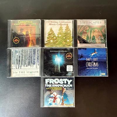 Sale Photo Thumbnail #542: 7 CDs in the lot. Includes Barbara Streisand, Celtic Christmas, Baby's First Christmas, and more.