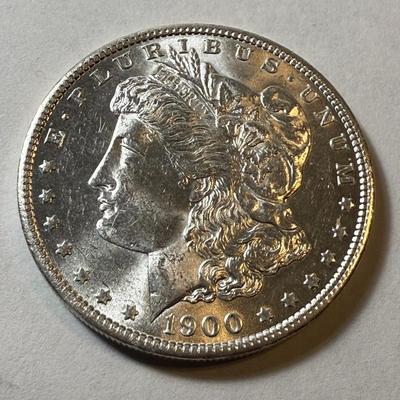 1900-O UNCIRCULATED CONDITION MORGAN SILVER DOLLAR AS PICTURED. (COIN #339).