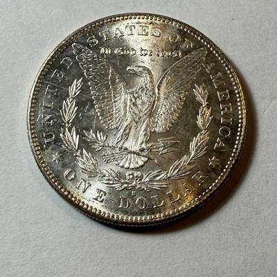 1878-S UNCIRCULATED CONDITION MORGAN SILVER DOLLAR AS PICTURED. (COIN #264).