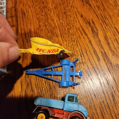 Lot of Matchbox, Corgi, Marx & Others Toy Vehicles , Booklets, Puzzles