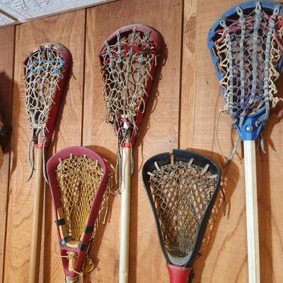 Lot of 7 LaCrosse Sticks & Helmet