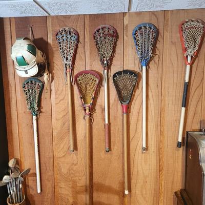 Lot of 7 LaCrosse Sticks & Helmet