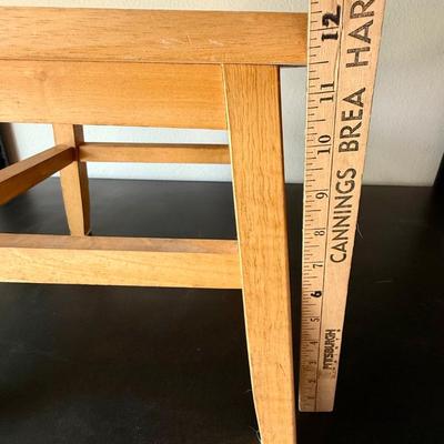 Sale Photo Thumbnail #585: Sturdy, solid wood step stool. Approx. 12" tall, top step measures approx. 12" x 12".  Great condition.