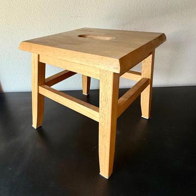 Sale Photo Thumbnail #580: Sturdy, solid wood step stool. Approx. 12" tall, top step measures approx. 12" x 12".  Great condition.