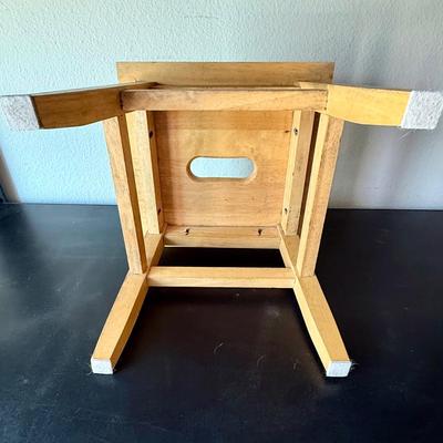 Sale Photo Thumbnail #582: Sturdy, solid wood step stool. Approx. 12" tall, top step measures approx. 12" x 12".  Great condition.
