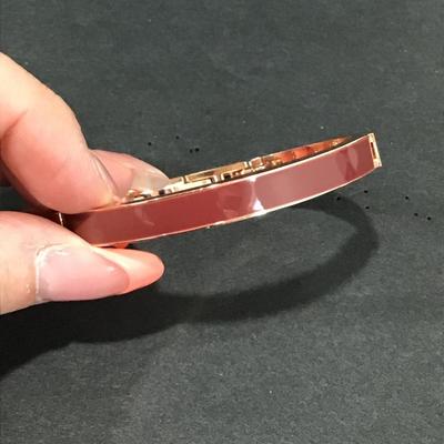 Very nice rose, gold toned, brown mauve enamel bracelet