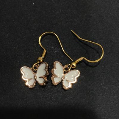Gold tone butterfly dangle earrings