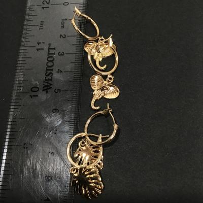 Gold tone dangle earrings