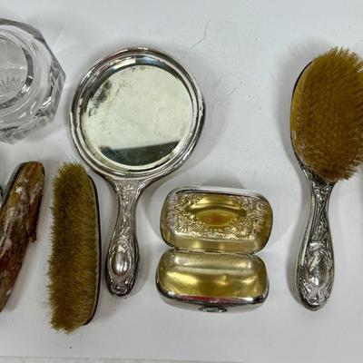 Sale Photo Thumbnail #82: Hand mirror, brushes, nail buffer, dresser Jar, Soap Box.  fair to good condition - there are dings and dents, and some deterioration of nail buffer pad, mirror clarity which is normal for the age of the pieces.. See photos for condition. All pieces are m