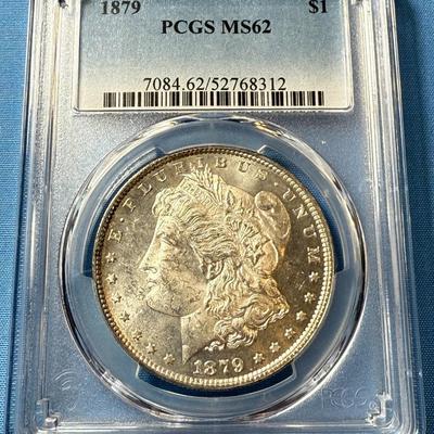 PCGS CERTIFIED 1879-P MS62 GRADED MORGAN SILVER DOLLAR AS PICTURED. (COIN #8312).