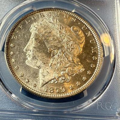 PCGS CERTIFIED 1879-P MS62 GRADED MORGAN SILVER DOLLAR AS PICTURED. (COIN #8312).