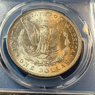 PCGS CERTIFIED 1879-P MS62 GRADED MORGAN SILVER DOLLAR AS PICTURED. (COIN #8312).