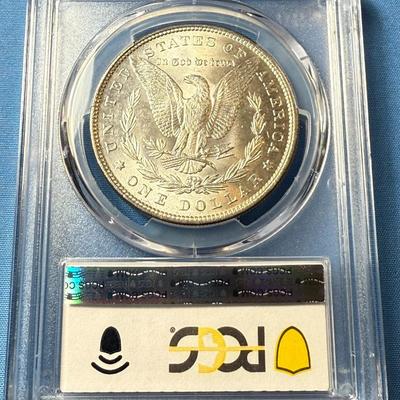 PCGS CERTIFIED 1879-P MS62 GRADED MORGAN SILVER DOLLAR AS PICTURED. (COIN #8312).
