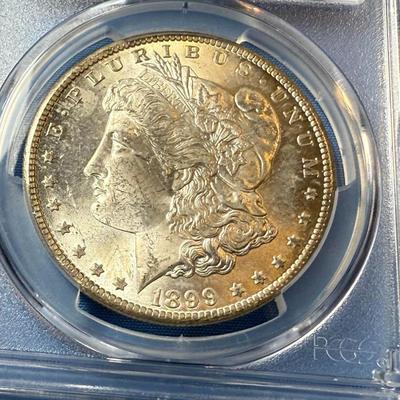 PCGS CERTIFIED 1899-O MS63 GRADED MORGAN SILVER DOLLAR AS PICTURED. (COIN #8316).